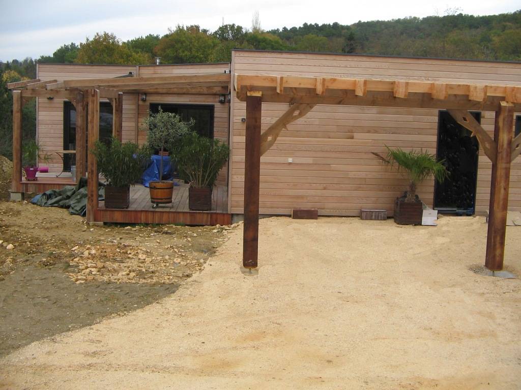 Photo d'une réalisation modulabois, terrasse en bois et pergolas en bois